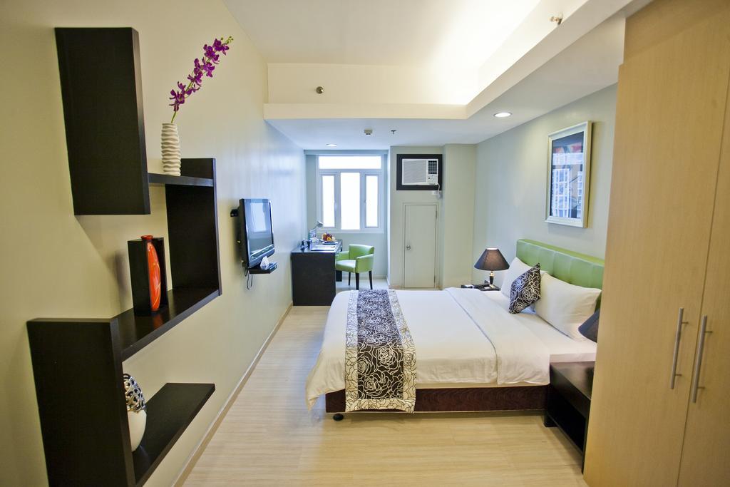 The Exchange Regency Residence Hotel Managed By Hii Pasig City Exterior foto