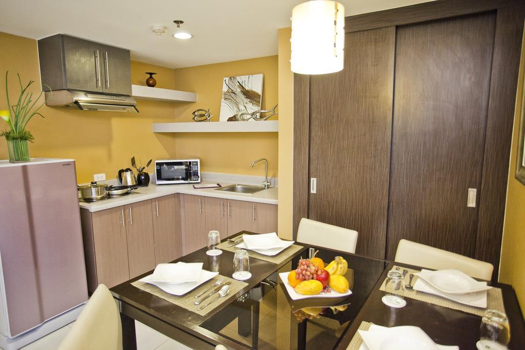 The Exchange Regency Residence Hotel Managed By Hii Pasig City Quarto foto