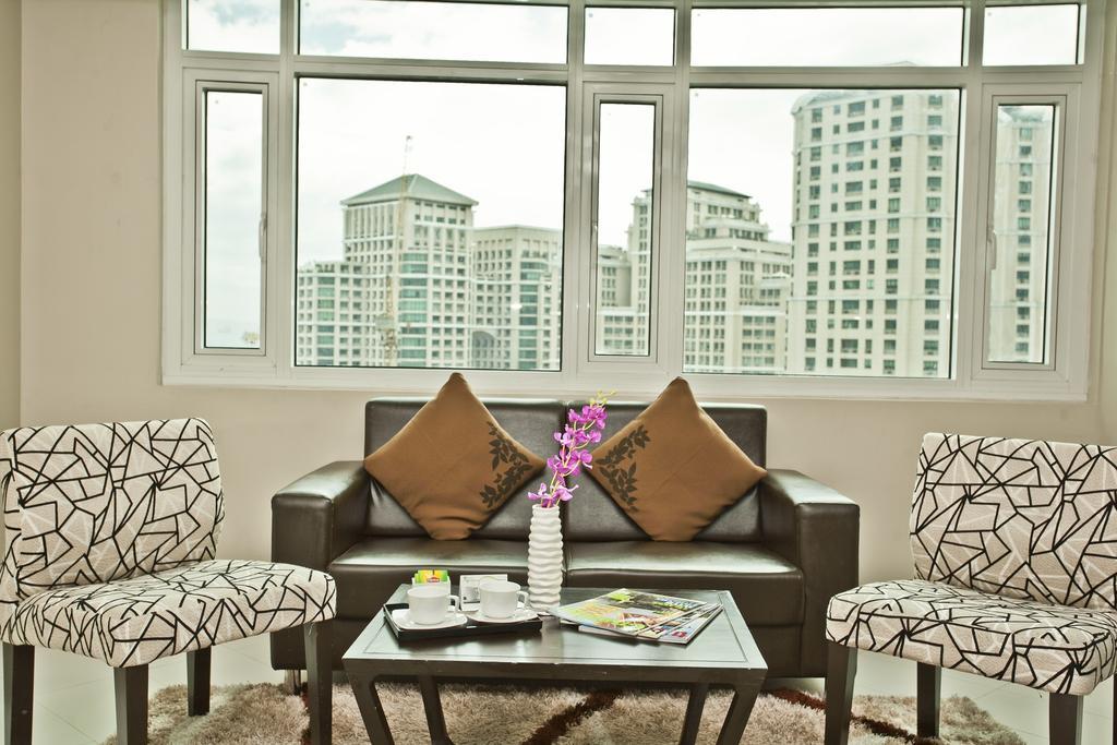 The Exchange Regency Residence Hotel Managed By Hii Pasig City Quarto foto