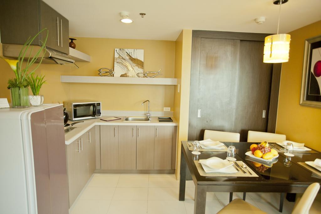 The Exchange Regency Residence Hotel Managed By Hii Pasig City Quarto foto